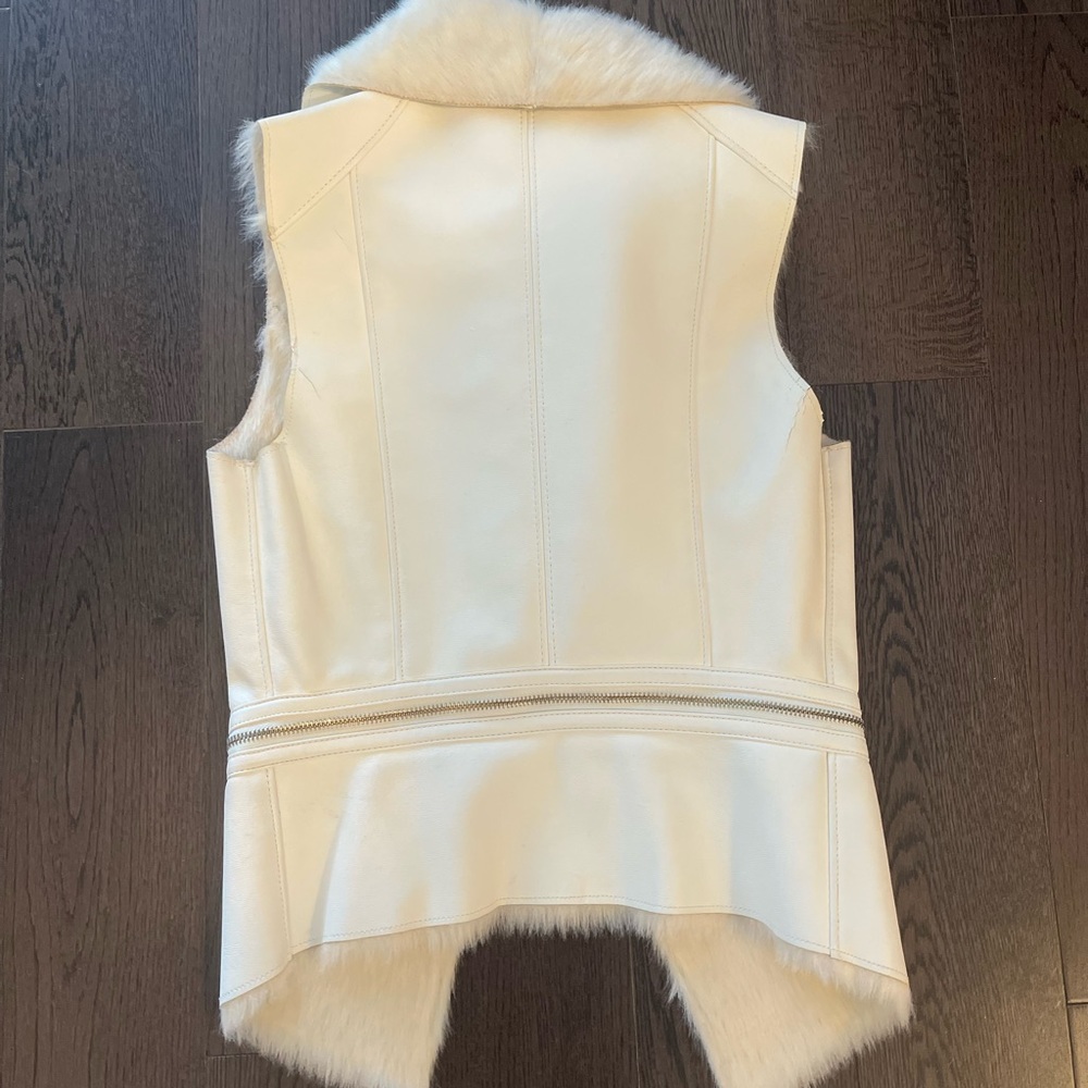 Reversible faux leather and fur vest